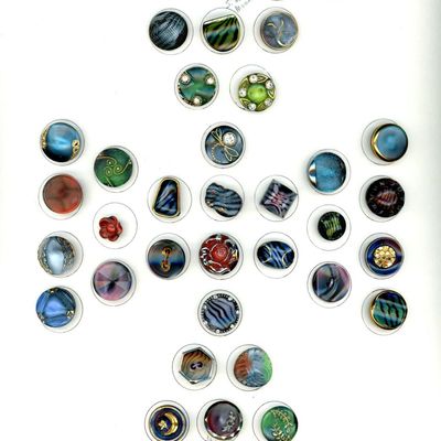 Sale Photo Thumbnail #229: A CARD OF DIVISION THREE SPECIALIZED GLASS BUTTONS