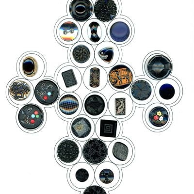 A CARD OF DIVIION ONE AND THREE BLACK GLASS BUTTONS