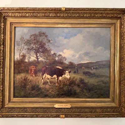 Framed antique oil painting titled 'Pastoral Scene' depicting cattle grazing in a landscape, set within an ornate gilded frame.