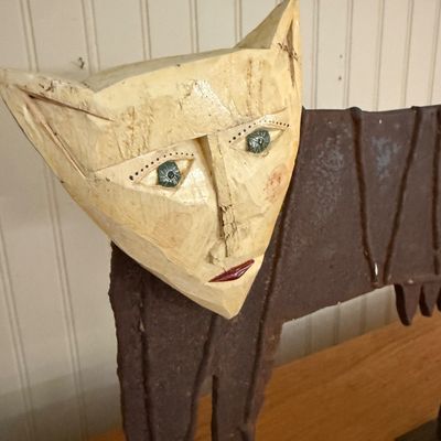 Heavy Metal and Wood Folk Art Sculpture with Angular Carved Face