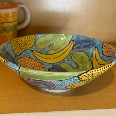 Collection of Colorful Decorative Ceramic Pottery, Serving Plates, Bowls, Teapot, and Mugs