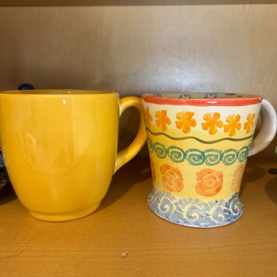 Collection of Colorful Decorative Ceramic Pottery, Serving Plates, Bowls, Teapot, and Mugs