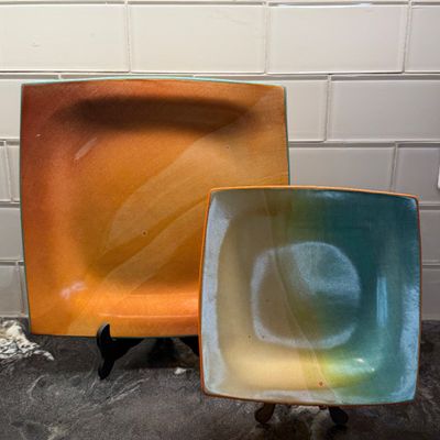 Collection of Colorful Decorative Ceramic Pottery, Serving Plates, Bowls, Teapot, and Mugs