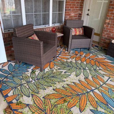 Sale Photo Thumbnail #4: Outdoor wicker chairs.  plus and assortment of outdoor rugs
