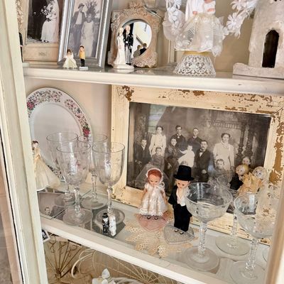 Sale Photo Thumbnail #9: Painted antique glass front cabinet  w/ assortment of vintage wedding cake toppers