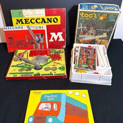 Playskool Puzzle, Meccano Erector Set, And Tog’l Building Block Set