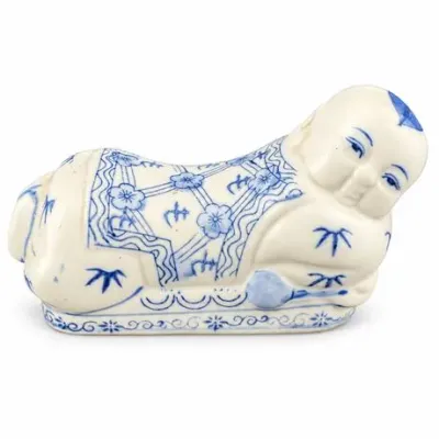 Lot 72   
Vintage Chinese Blue and White Porcelain Reclining Boy Headrest / Opium Pillow