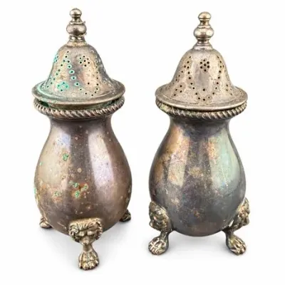 Lot 194  
George III–Style Silverplate Casters (Salt & Pepper) on Lion-Mask Paw Feet