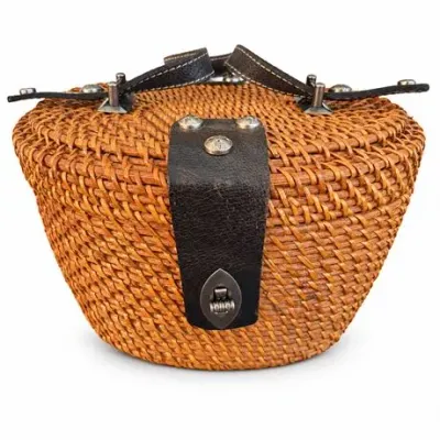Lot 543   
Patricia Nash Woven Rattan Basket Handbag with Leather Straps