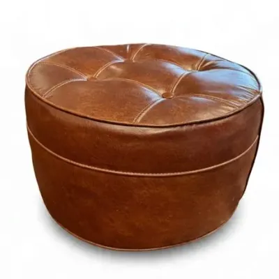 Lot 023   
Vintage Mid-Century Round Tufted Vinyl Rolling Ottoman