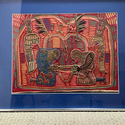 Framed hand-sewn Guna (Kuna) mola panel