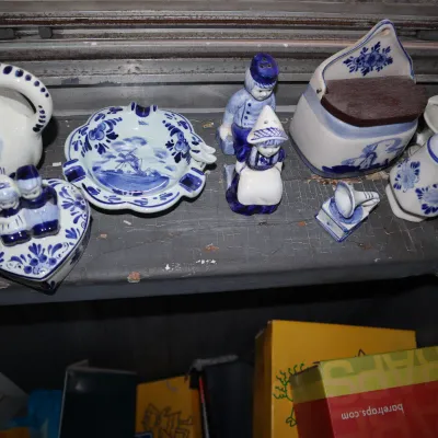 Sale Photo Thumbnail #173: Collection of vintage Delfts Blue style porcelain collectibles, including a pitcher, salt and pepper shakers, trinket box, and wall-mounted salt cellar.