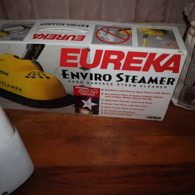 Sale Photo Thumbnail #90: Vintage Eureka Enviro Steamer model 300A hard surface steam cleaner in its original box, circa late 1990s.