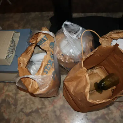 Sale Photo Thumbnail #26: Collection of packed dishware, glassware, and serving pieces in shopping bags and boxes.