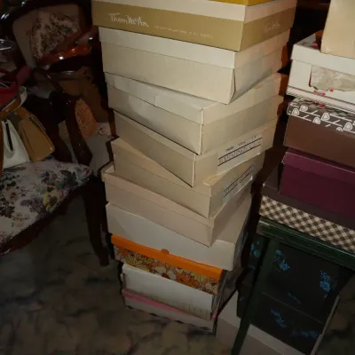 Sale Photo Thumbnail #44: Tall stack of vintage cardboard shoeboxes, including brands like Thom McAn and Rootalinos.