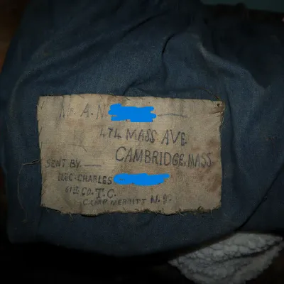 Sale Photo Thumbnail #83: Vintage military duffel bag with a hand-lettered cloth address tag referencing Camp Merritt, N.J.