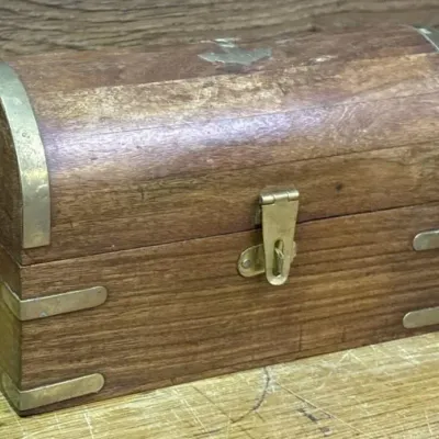 Sale Photo Thumbnail #314: Lot 415: Wooden atched-lid treasure chest