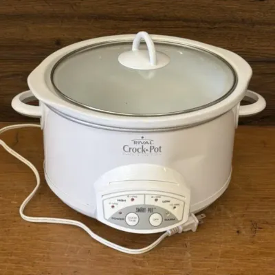 Sale Photo Thumbnail #398: Lot 499: RIVAL 5 quart smart crockpot /has a small dent, but functional