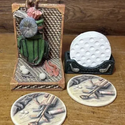 Sale Photo Thumbnail #634: Lot 738: Golfing coasters and home decor