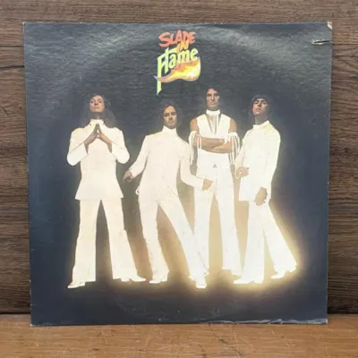 Sale Photo Thumbnail #217: Lot 288: 1975 Slade in Flame vinyl record Album and dust jacket in excellent shape/record excellent