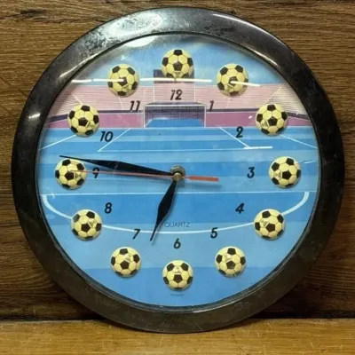Sale Photo Thumbnail #573: Lot 677: Quartz soccer themed wall clock