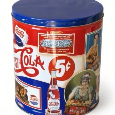 Sale Photo Thumbnail #6: Lot 6: Retro Pepsi-Cola Cylindrical Tin – 1909 Ad Art, 5¢ Bottle & Logo Graphics