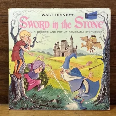 Sale Photo Thumbnail #191: Lot 262: Walt Disney sword in the Stone record and pop-up storybook 1961