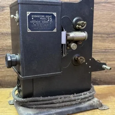 Sale Photo Thumbnail #308: Lot 409: 1930s Kodascope Eight Model 50 8mm move Projector