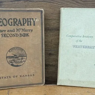 Sale Photo Thumbnail #440: Lot 540: 1920s state of Kansas geography book/1950s vertebrae autonomy school book