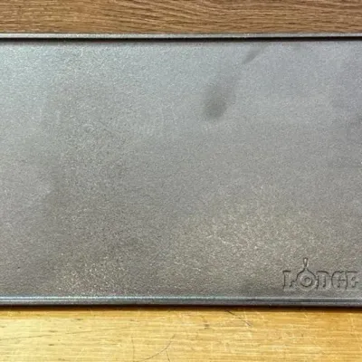 Sale Photo Thumbnail #184: Lot 255: Lodge cast iron cooking sheet dual sided