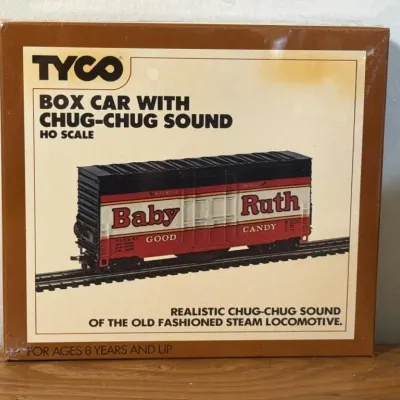 Sale Photo Thumbnail #257: Lot 328: New Tyco HO scale Baby Ruth candy tain box car w/ Chug Chug sound