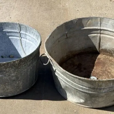 Sale Photo Thumbnail #78: Lot 151: 2 vintage galvanized wash tubs
