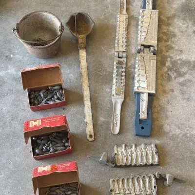 Sale Photo Thumbnail #98: Lot 171: Lead fishing sinkers, smelt pot, ladle & 3 molds