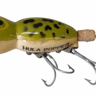 Sale Photo Thumbnail #112: Lot 185: Vintage Hula Popper fishing lure. Classic green frog-style topwater