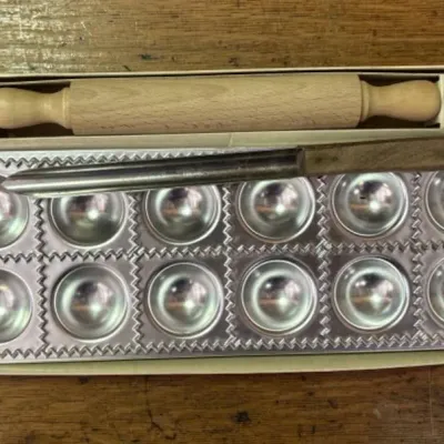 Sale Photo Thumbnail #172: Lot 243: Vintage ravioli making set