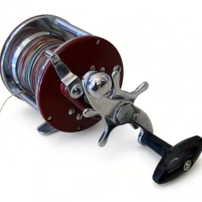 Sale Photo Thumbnail #99: Lot 172: Vintage Pflueger Bond level-wind baitcasting reel, made in the USA