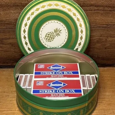 Sale Photo Thumbnail #574: Lot 678: Pineapple tin of matches