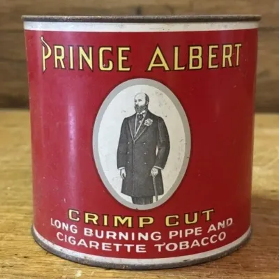 Sale Photo Thumbnail #320: Lot 421: 1950s Prince Albert, tobacco tin