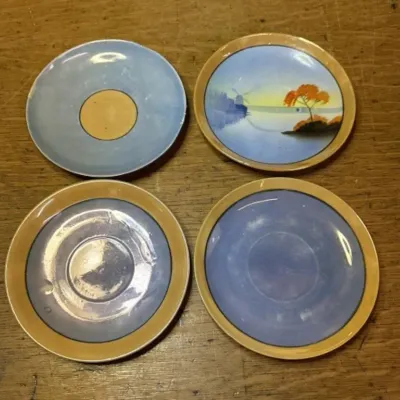 Sale Photo Thumbnail #644: Lot 748: Lusterware tea cup plates