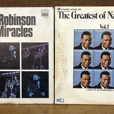 Sale Photo Thumbnail #588: Lot 692: The greatest of Nat King Cole and Smoky Robinson, and the miracles records, both have sleeves