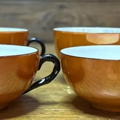 Sale Photo Thumbnail #656: Lot 760: Vintage Lusterware orange tea cups