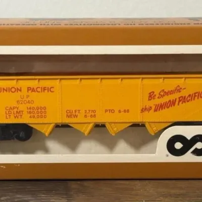 Sale Photo Thumbnail #251: Lot 322: Tyco HO scale U.P. hopper train car