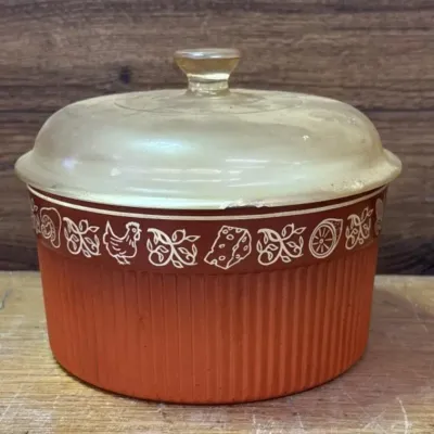 Sale Photo Thumbnail #175: Lot 246: Nordic ware vintage casserole dish Glass Lid has Chips on rim