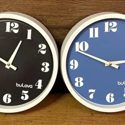 Sale Photo Thumbnail #599: Lot 703: Set of bulova wall clocks