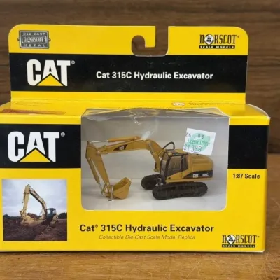 Sale Photo Thumbnail #451: Lot 551: Diecast toy cat 315 C hydraulic excavator