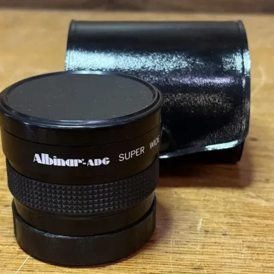 Sale Photo Thumbnail #571: Lot 675: Albinar-adg super wide, fish eye conversion lens camera lens
