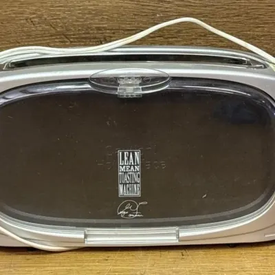 Sale Photo Thumbnail #492: Lot 592: George Foreman lean mean toasting machine