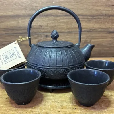 Sale Photo Thumbnail #502: Lot 602: Kafuh cast iron tea kettle set