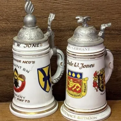 Sale Photo Thumbnail #476: Lot 576: Two vintage Steins