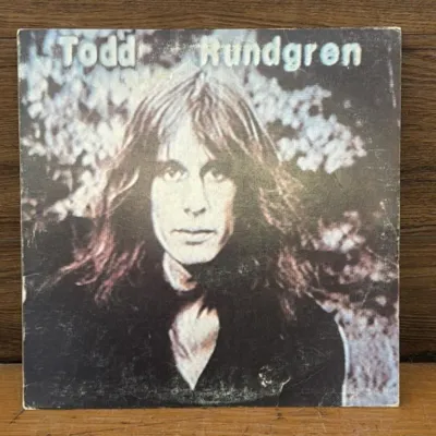Sale Photo Thumbnail #215: Lot 286: 1978 Todd Rundgren vinyl record Has dust jacket/bottle record is in good condition